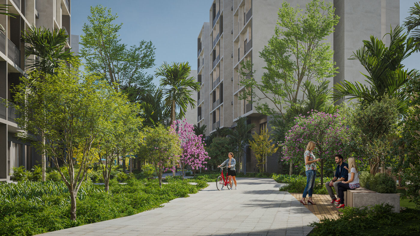Paseo peatonal arbolado dentro del desarrollo Costa Blanca